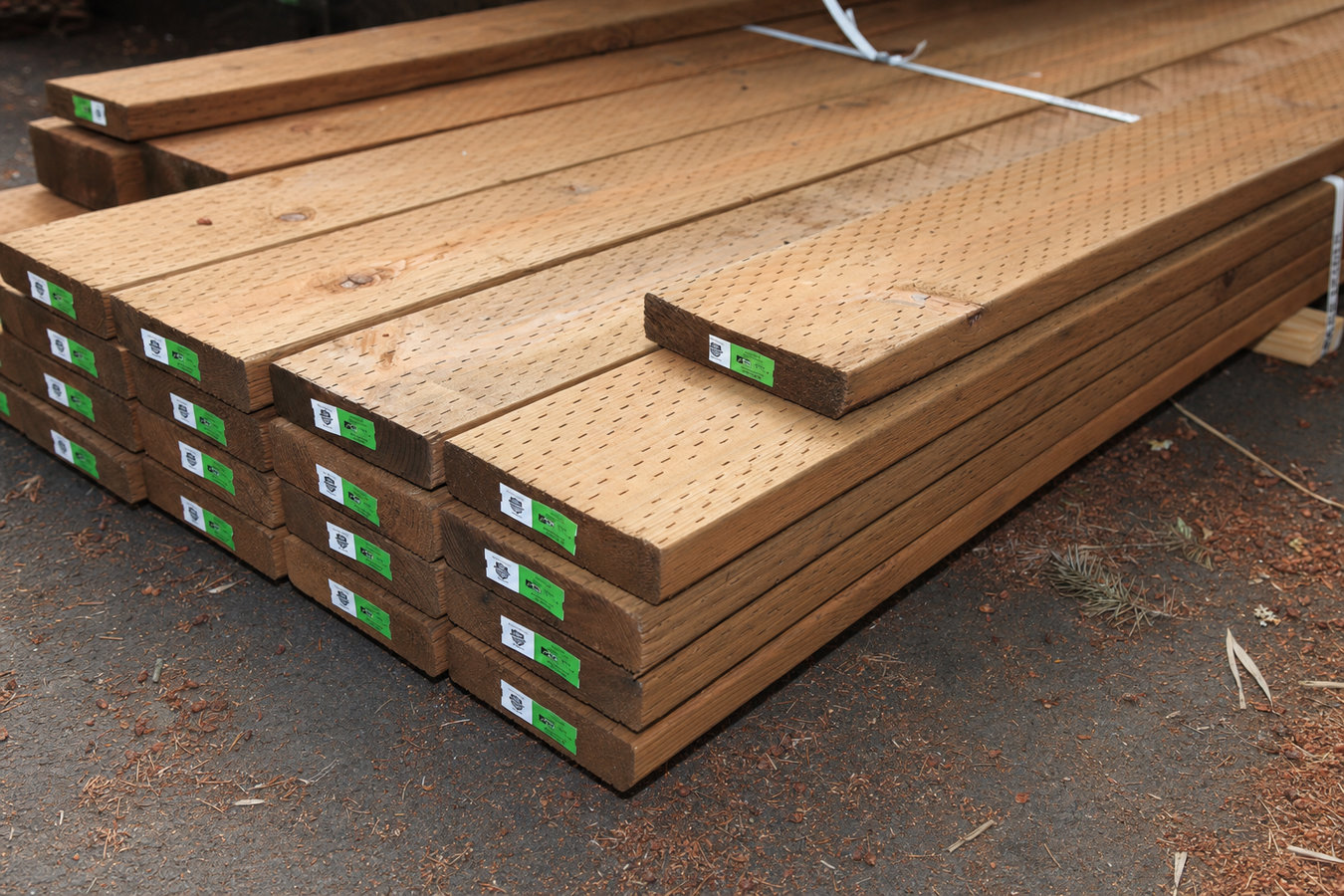 Pressure-treated wood deck construction